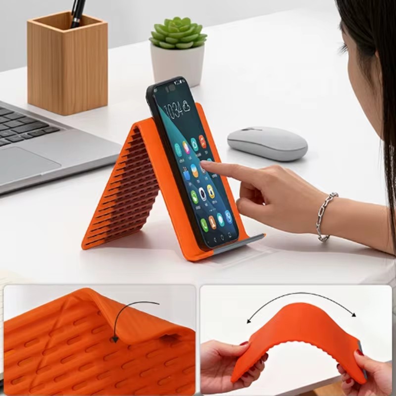 携帯用シリコン製携帯電話ホルダー、自由に曲げられるフレキシブ - Quirky Phone Accessories のレビューと価格